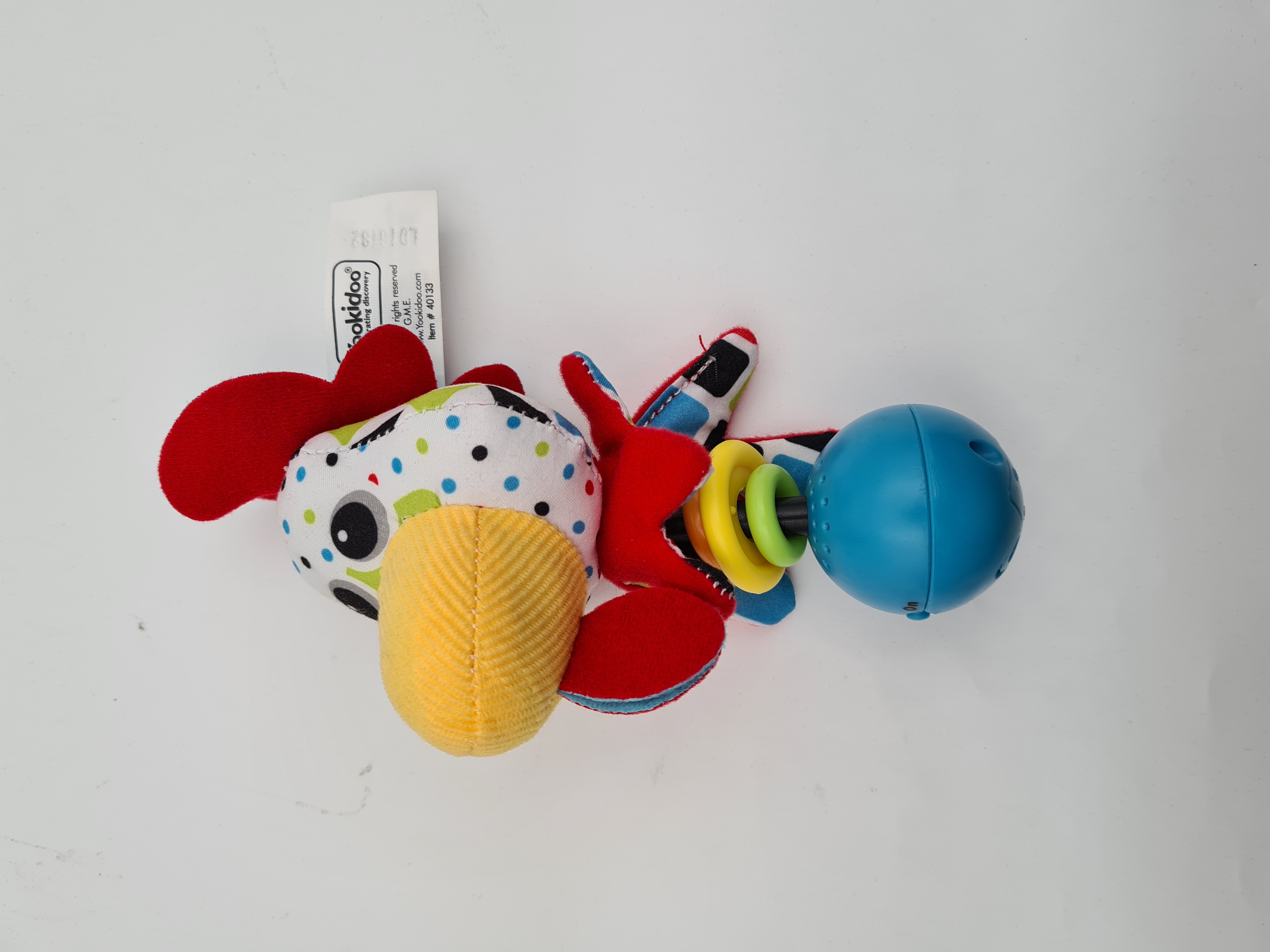 Billede fra myndighedens meddelelse af det tilbagekaldte produkt Shake me Rattle Rooster. Årsag: OKTILTAG.