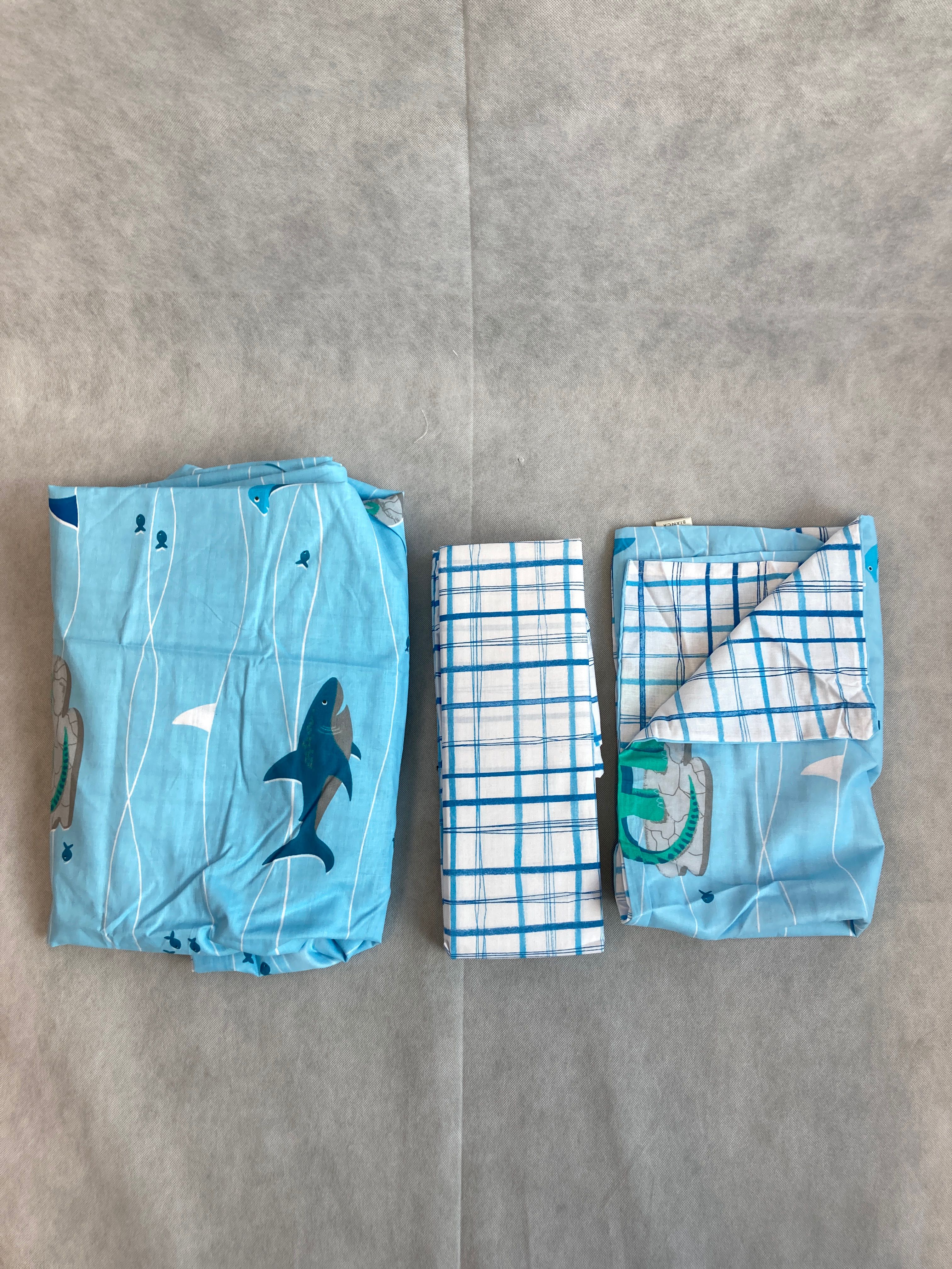 Billede fra myndighedens meddelelse af det tilbagekaldte produkt Dinoshark Duvet Set & Fitted Sheet. Årsag: OKTILTAG.
