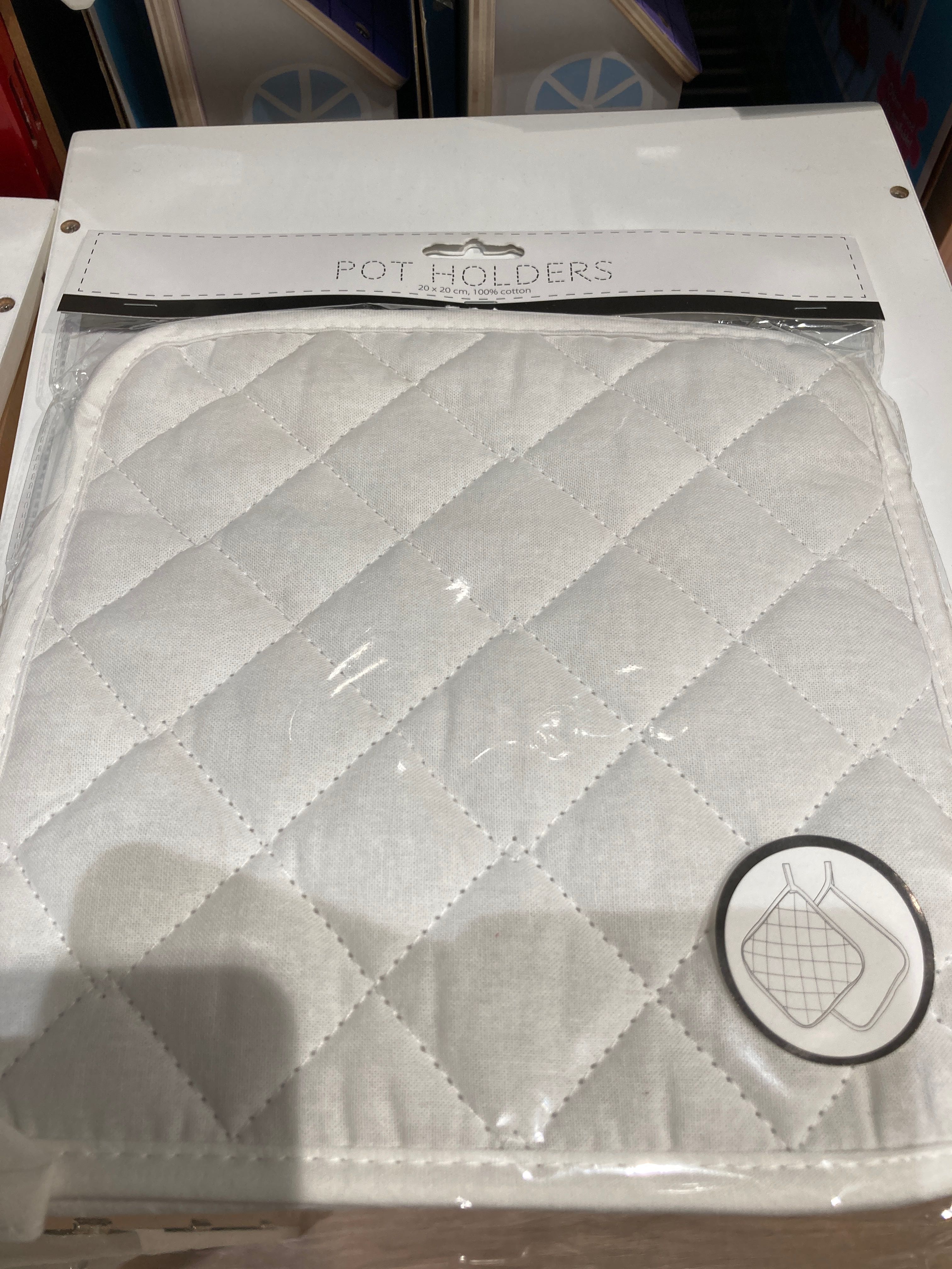 Billede fra myndighedens meddelelse af det tilbagekaldte produkt Pot holders. Årsag: OVERTRÆD.