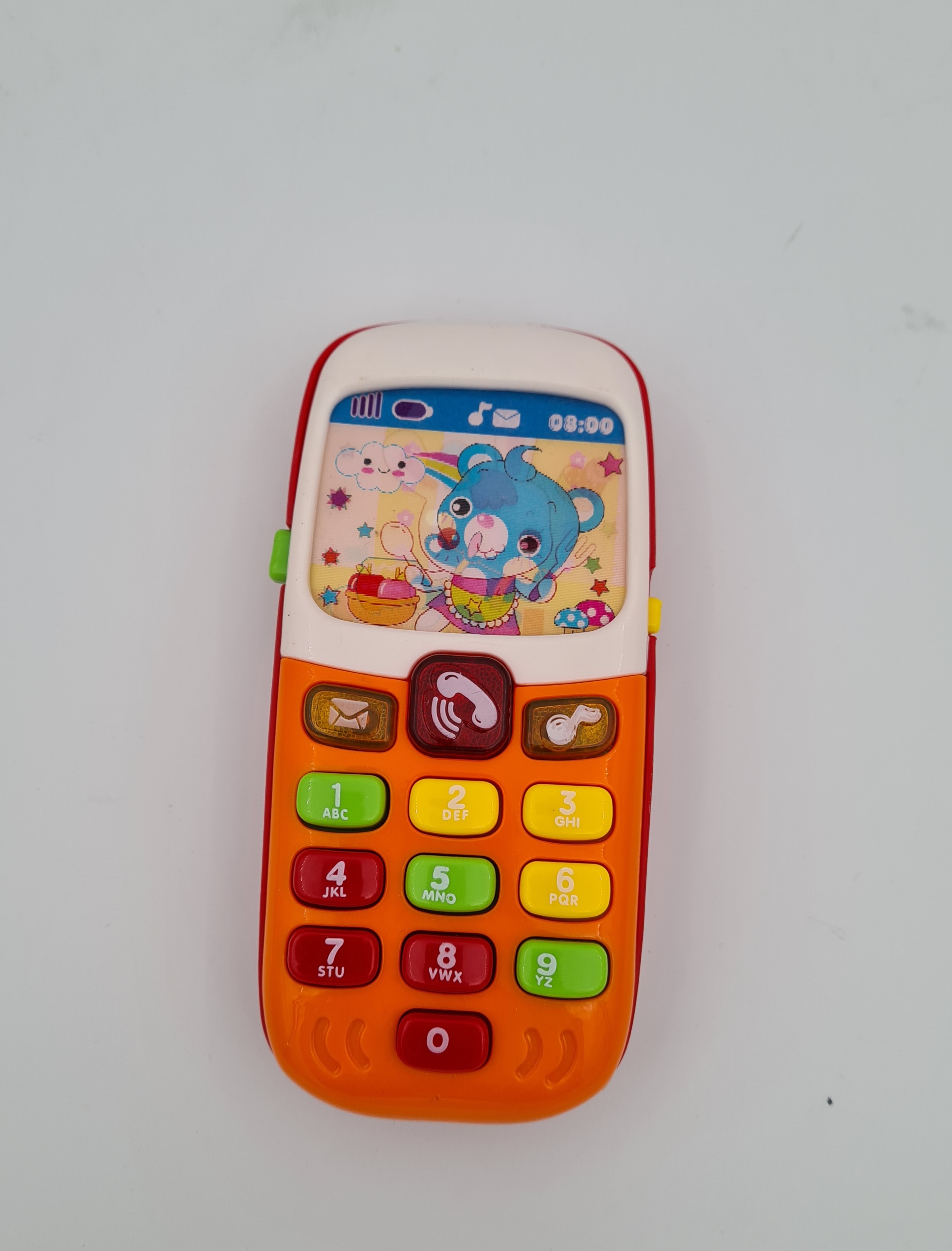 Billede fra myndighedens meddelelse af det tilbagekaldte produkt Elektronisk baby mobiltelefon. Årsag: OVERTRÆD.