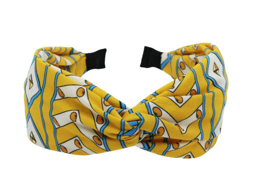 Billede fra myndighedens meddelelse af det tilbagekaldte produkt HANDMADE 70'S PRINT KNOT HEADBAND. Årsag: OKTILTAG.