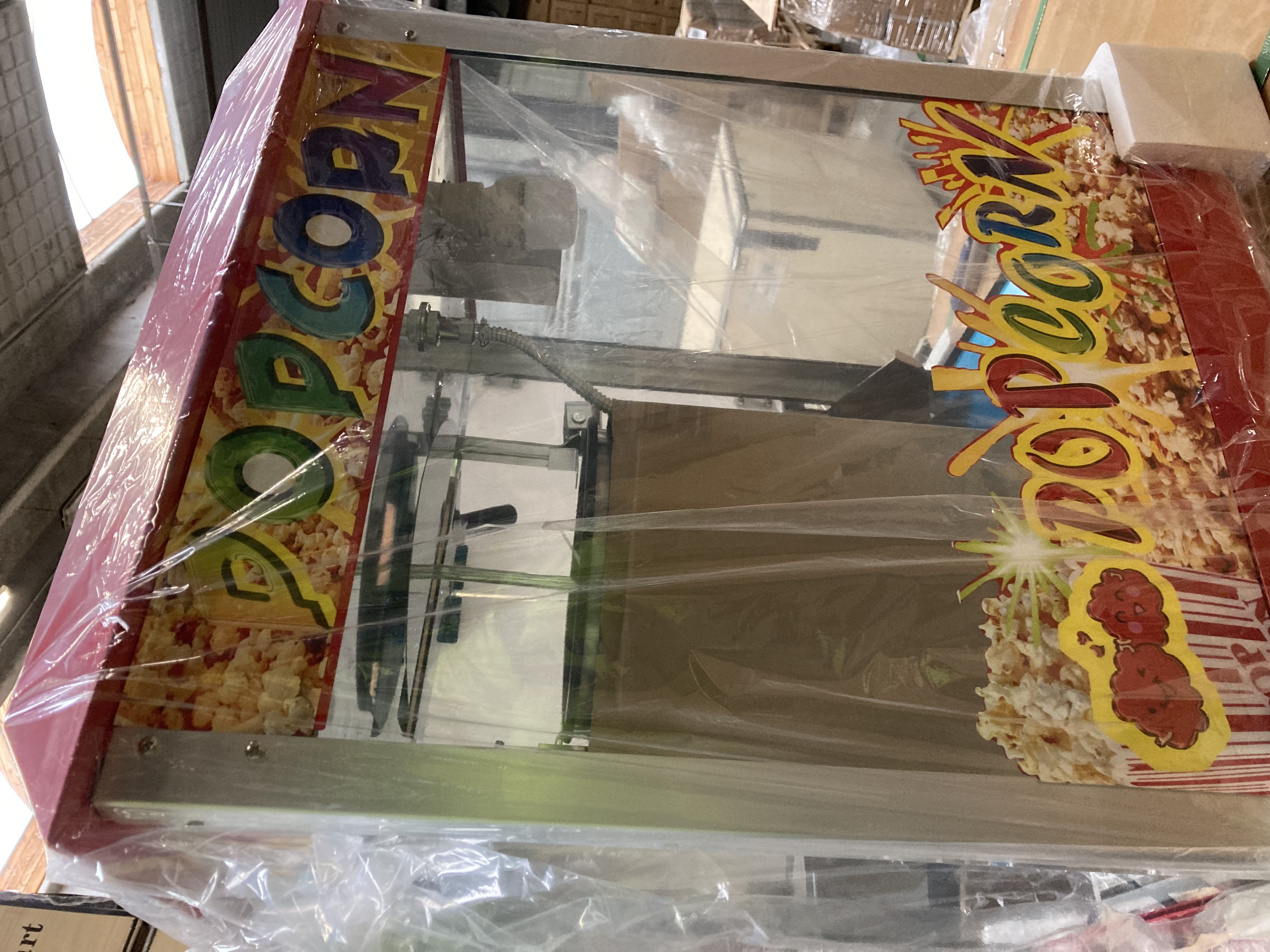 Billede fra myndighedens meddelelse af det tilbagekaldte produkt Popcorn Machine. Årsag: OVERTRÆD.