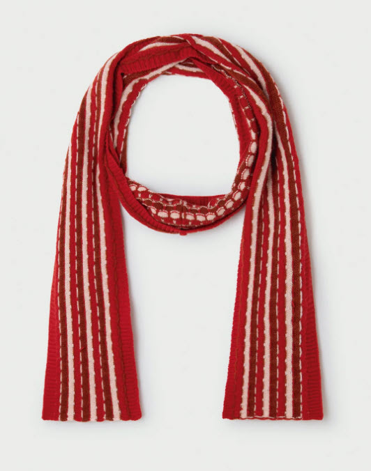 Billede fra myndighedens meddelelse af det tilbagekaldte produkt Red Ziggy Scarf. Årsag: OVERTRÆD.