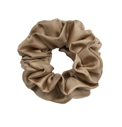 Billede fra myndighedens meddelelse af det tilbagekaldte produkt SOLID SCRUNCHIE - BEIGE. Årsag: OVERTRÆD.