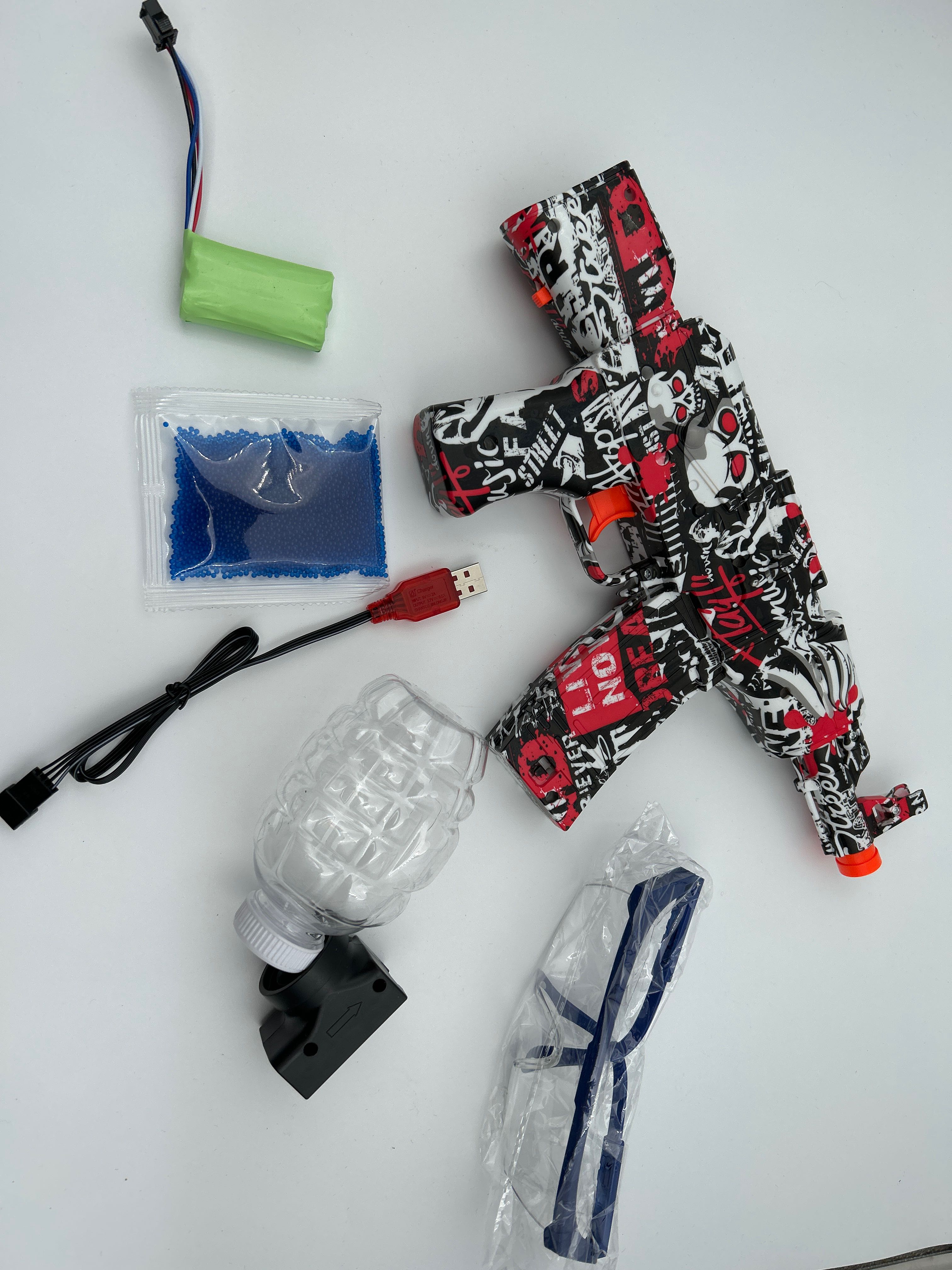 Billede fra myndighedens meddelelse af det tilbagekaldte produkt Gel Blasters Mini AK. Årsag: OVERTRÆD.