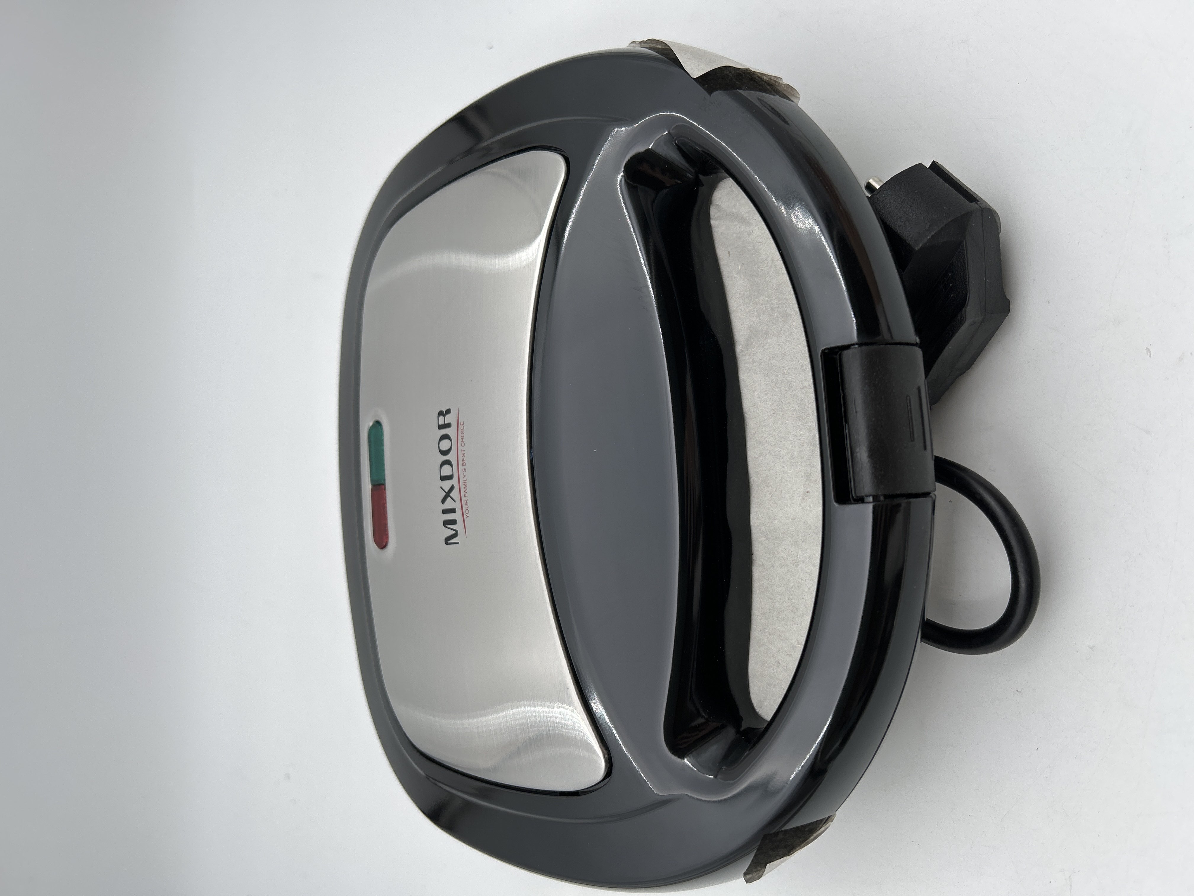 Billede fra myndighedens meddelelse af det tilbagekaldte produkt Mini Donut Maker Machine. Årsag: OVERTRÆD.