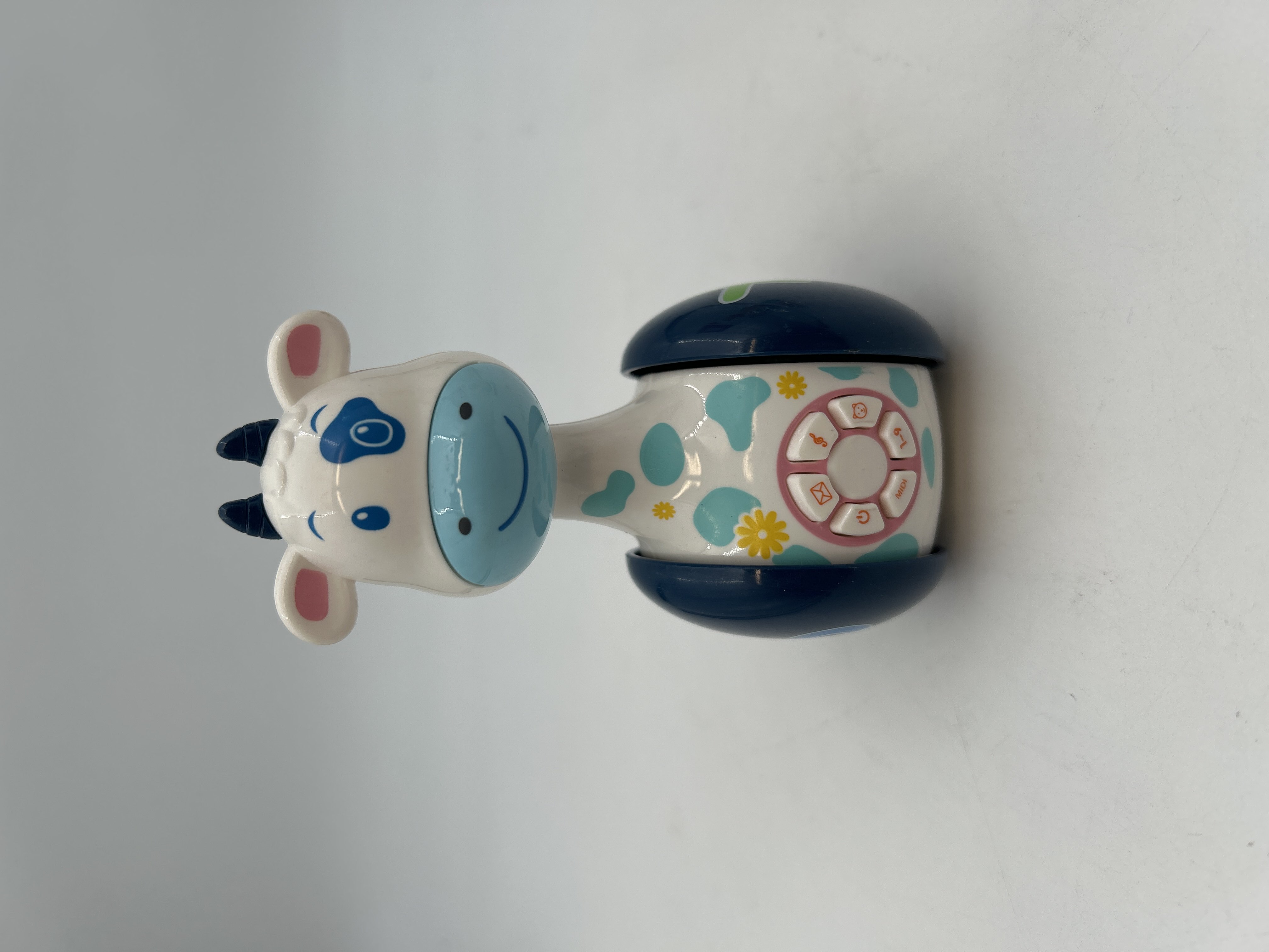 Billede fra myndighedens meddelelse af det tilbagekaldte produkt Baby Rattles Tumbler Doll Baby Toys Sweet Bell Music Roly-Poly Learning Toys. Årsag: OVERTRÆD.