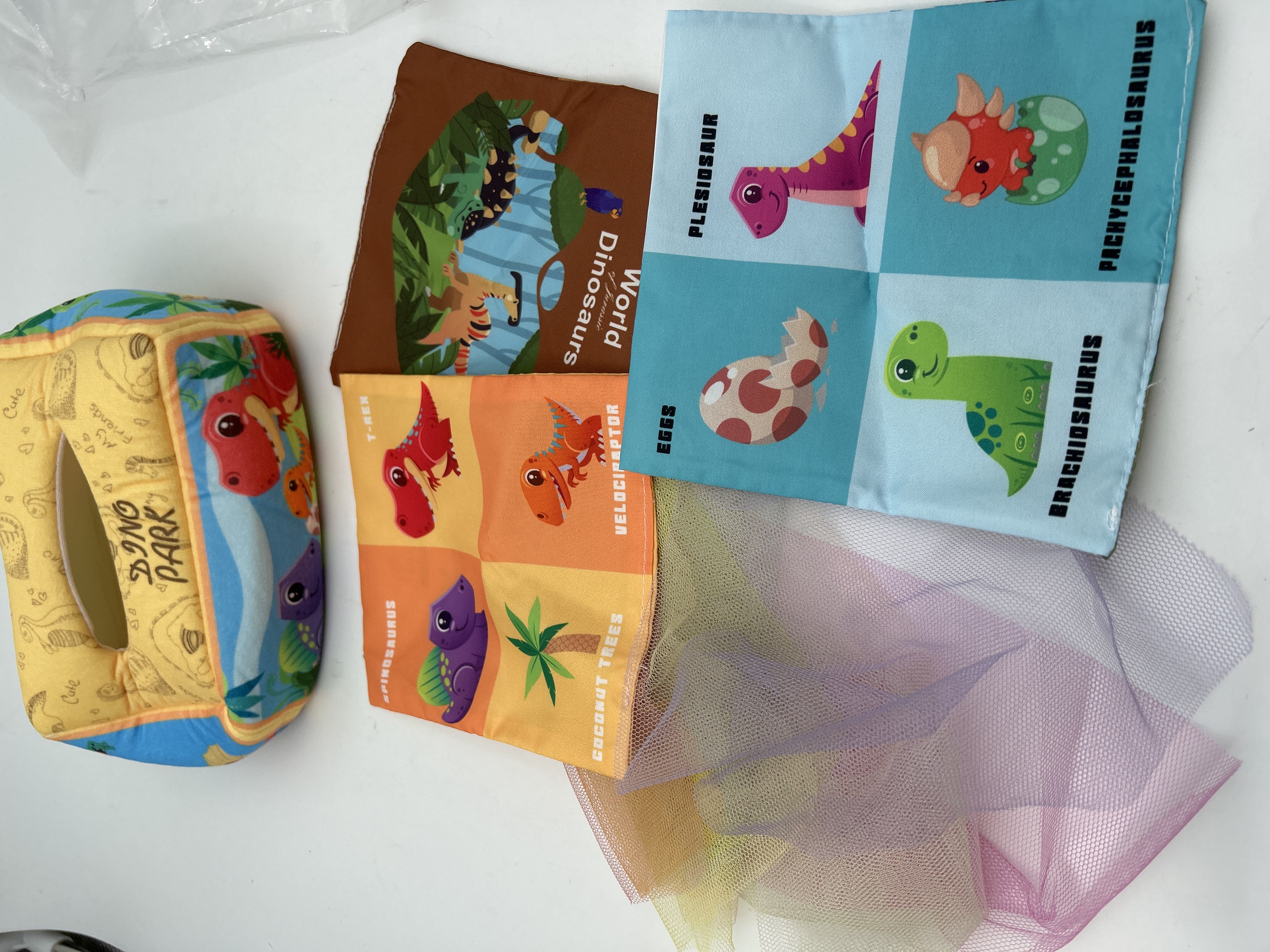 Billede fra myndighedens meddelelse af det tilbagekaldte produkt Montessori, Tissue Toy, Pull And Play Aktivitetslegetøj. Årsag: OVERTRÆD.
