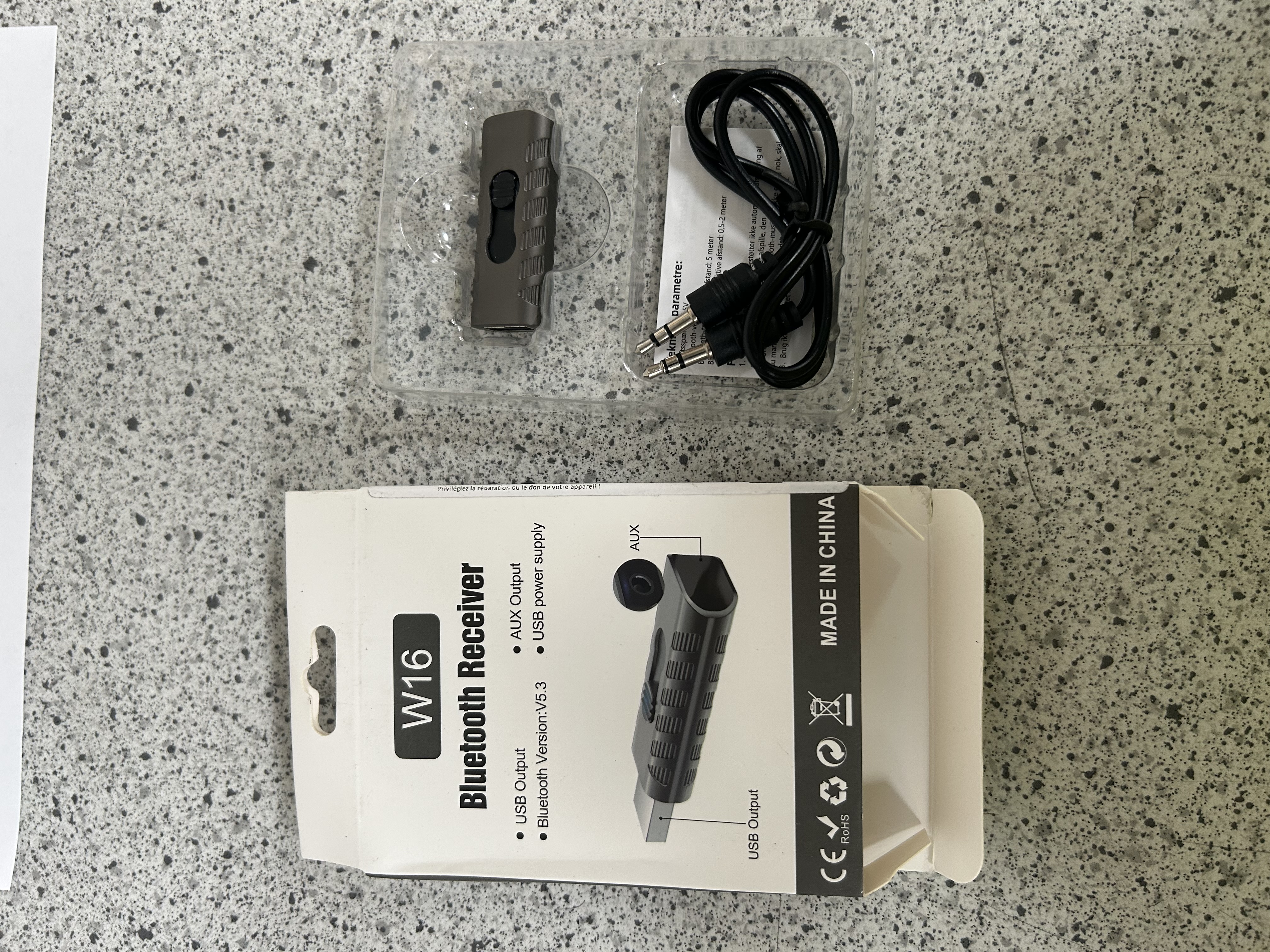 Billede fra myndighedens meddelelse af det tilbagekaldte produkt Bluetooth modtager W16. Årsag: OVERTRÆD.