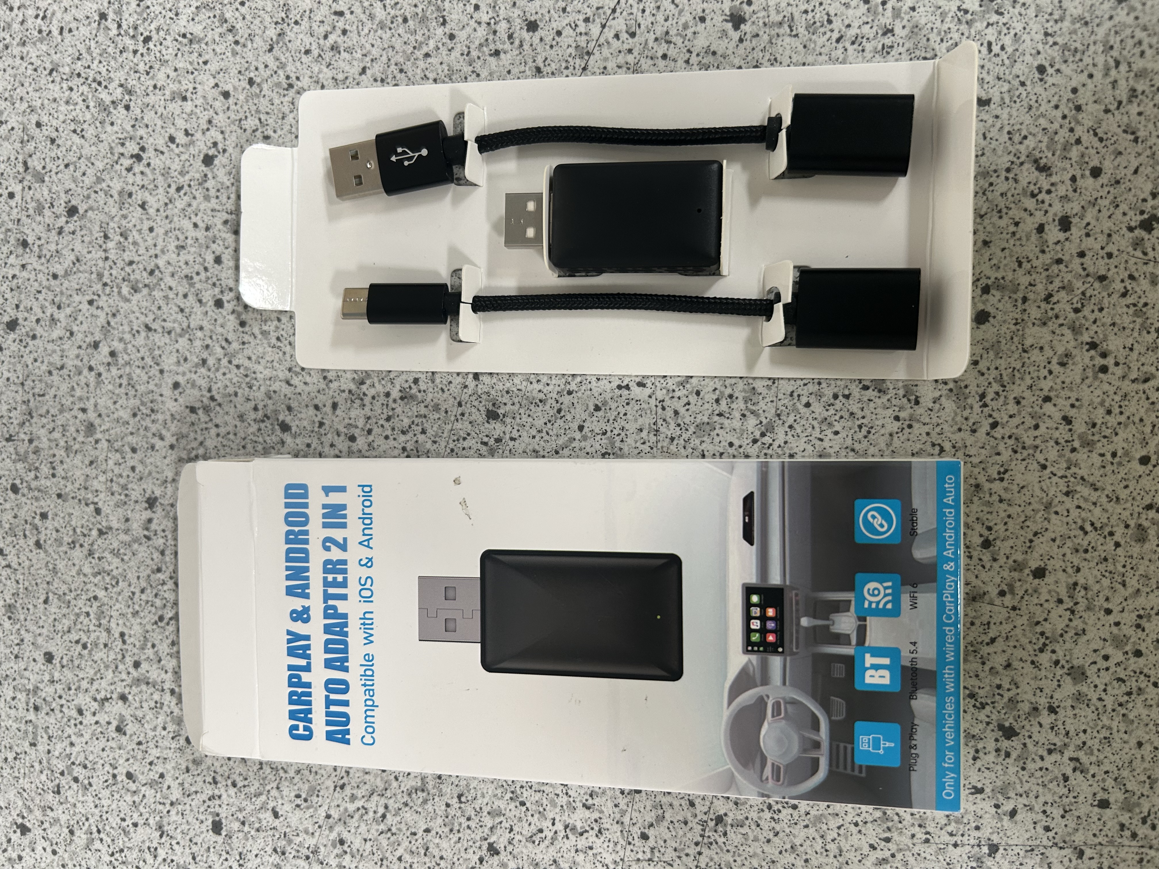 Billede fra myndighedens meddelelse af det tilbagekaldte produkt 2 in 1 Wireless Adapter TAB01. Årsag: OVERTRÆD.