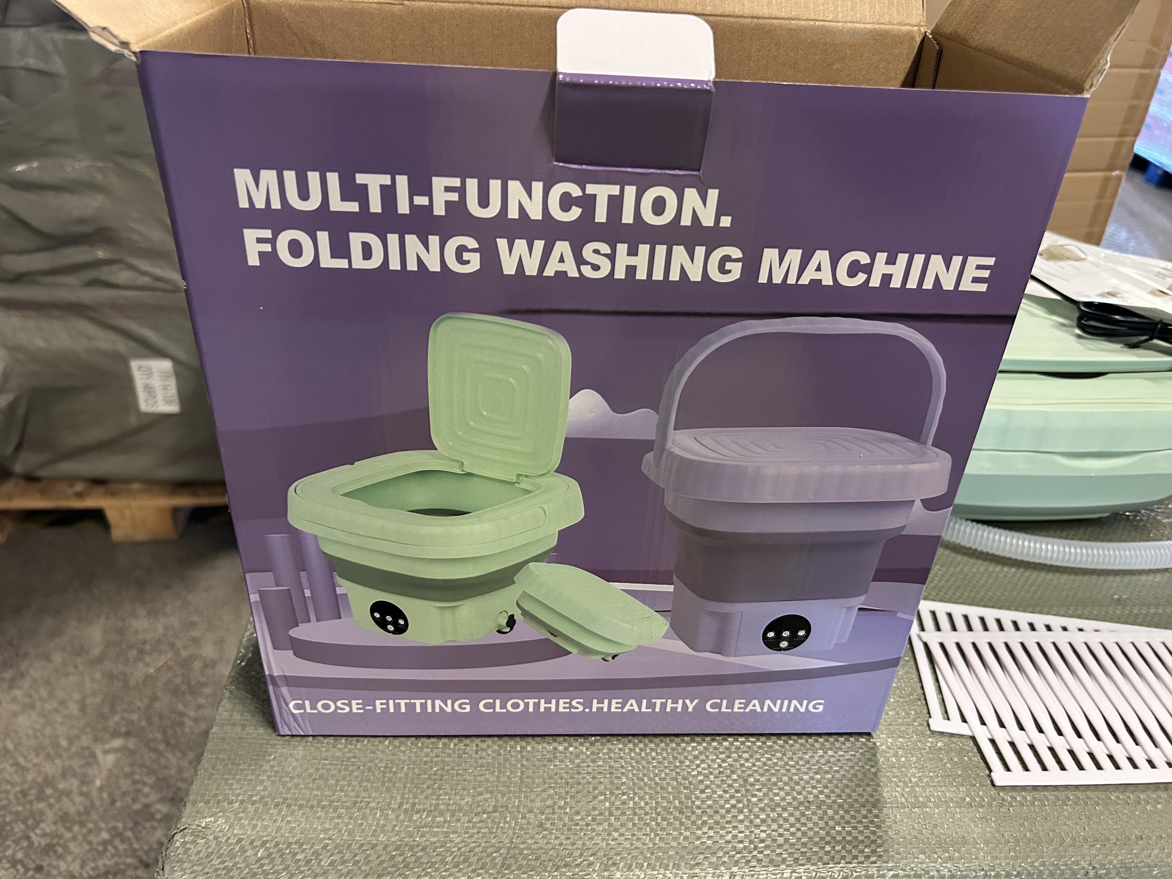 Billede fra myndighedens meddelelse af det tilbagekaldte produkt Folding washing machine. Årsag: OVERTRÆD.