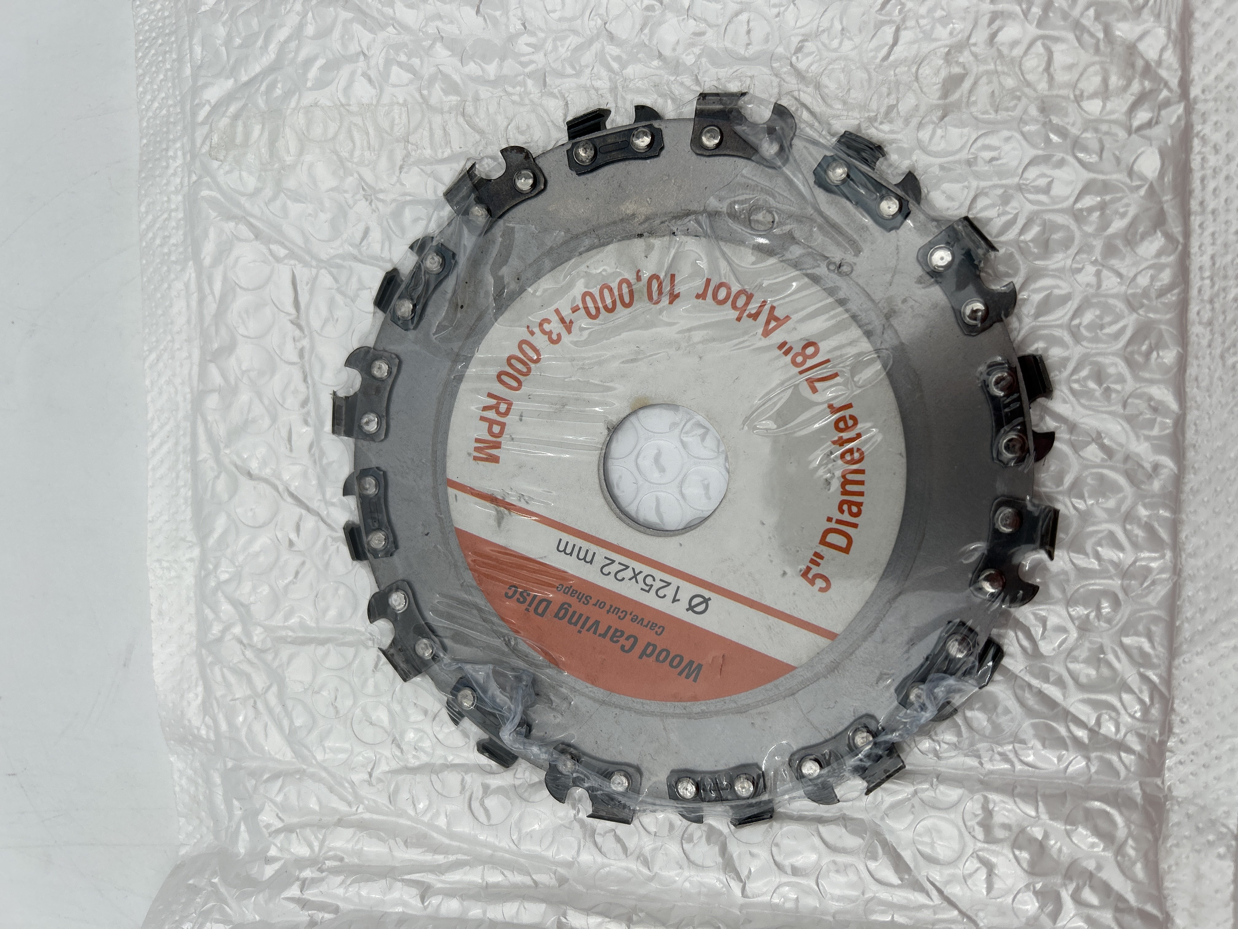 Billede fra myndighedens meddelelse af det tilbagekaldte produkt 5 Inch 16-Tooth Wood Carving Disc For Angle Grinder. Årsag: OVERTRÆD.