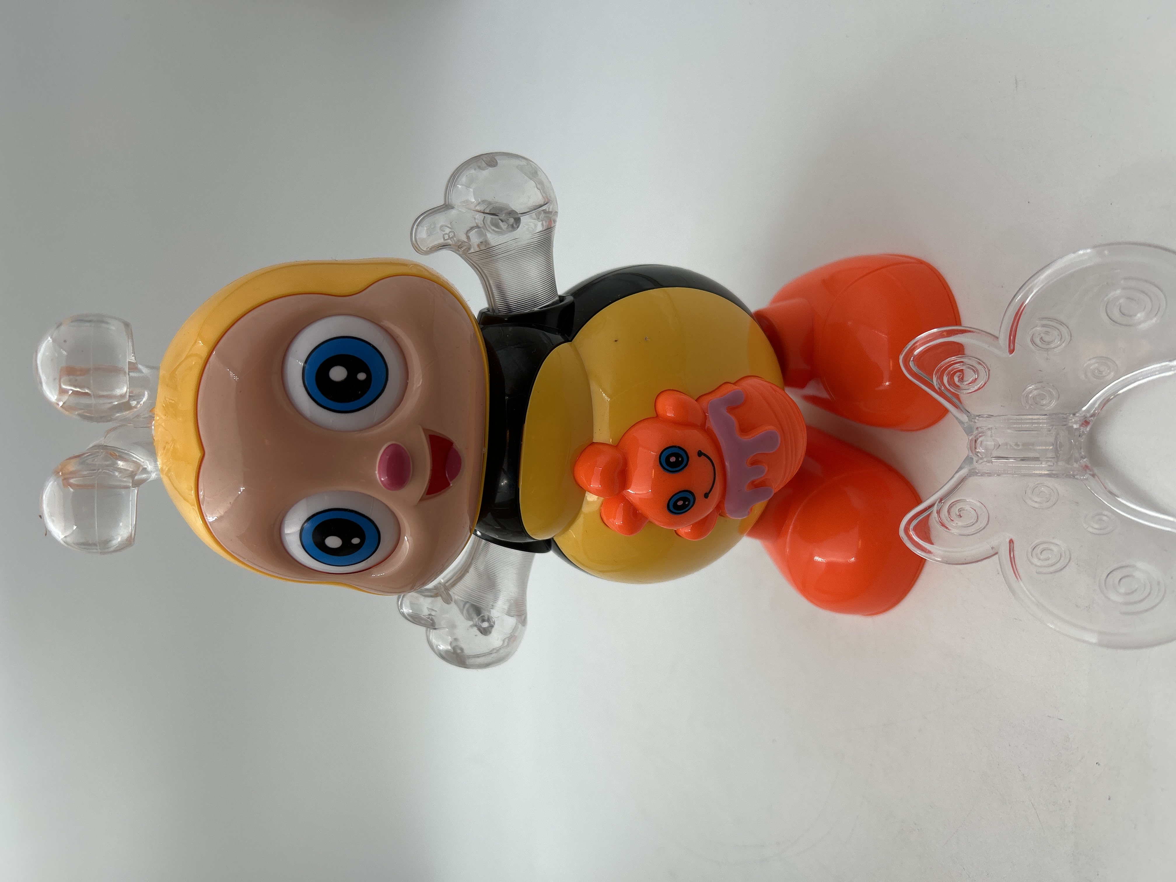 Billede fra myndighedens meddelelse af det tilbagekaldte produkt Happy Bee Youngsters Electronic Dance Toy - Interactive Music Learning Toy. Årsag: OVERTRÆD.